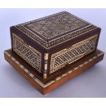 AN UNUSUAL EARLY 20TH CENTURY ISLAMIC MUSICAL CIGARETTE BOX, decorated with extensive micro mosaic i