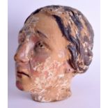 A GOOD 18TH CENTURY POLYCHROMED WOOD HEAD OF A FEMALE of good colour and patina. 23 cm x 16 cm.