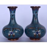 A PAIR OF MID 19TH CENTURY CHINESE CLOISONNE ENAMEL VASE, bulbous in shape and decorated with stylis