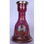 A LARGE BOHEMIAN GLASS BOTTLE VASE, decorated with a portrait of a gentleman and gilt foliage. 26.5