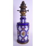 A 19TH CENTURY BOHEMIAN BLUE OPALINE FLASH VASE converted to an oil lamp. 40 cm high.