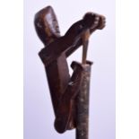 A RARE 19TH CENTURY FOLK ART CARVED WOOD WHIRLIGIG possibly African. 36 cm long not inc thin pipe.