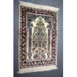 AN EARLY 20TH CENTURY BEIGE GROUND KASHMIR PRAYER RUG, decorated with extensive foliage. 96 cm x 59