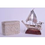 A 19TH CENTURY MIDDLE EASTERN SILVER BOX together with a silver boat. 9 oz. (2)