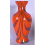MANNER OF PETER LAYTON A LARGE STYLISH ORANGE GROUND ABSTRACT TYPE GLASS VASE, formed with baluster