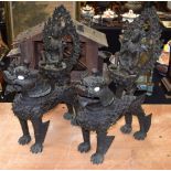 A LARGE PAIR OF 19TH CENTURY MIDDLE EASTERN ASIAN BRONZE BEASTS modelled with attendants. 60 cm x 32