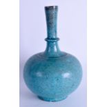 A 19TH CENTURY PERSIAN KASHAN TURQUOISE FAIENCE VASE of bulbous form. 19.5 cm high.