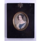 A MID 19TH CENTURY CONTINENTAL PAINTED IVORY PORTRAIT MINIATURE depicting a female within a blue dre