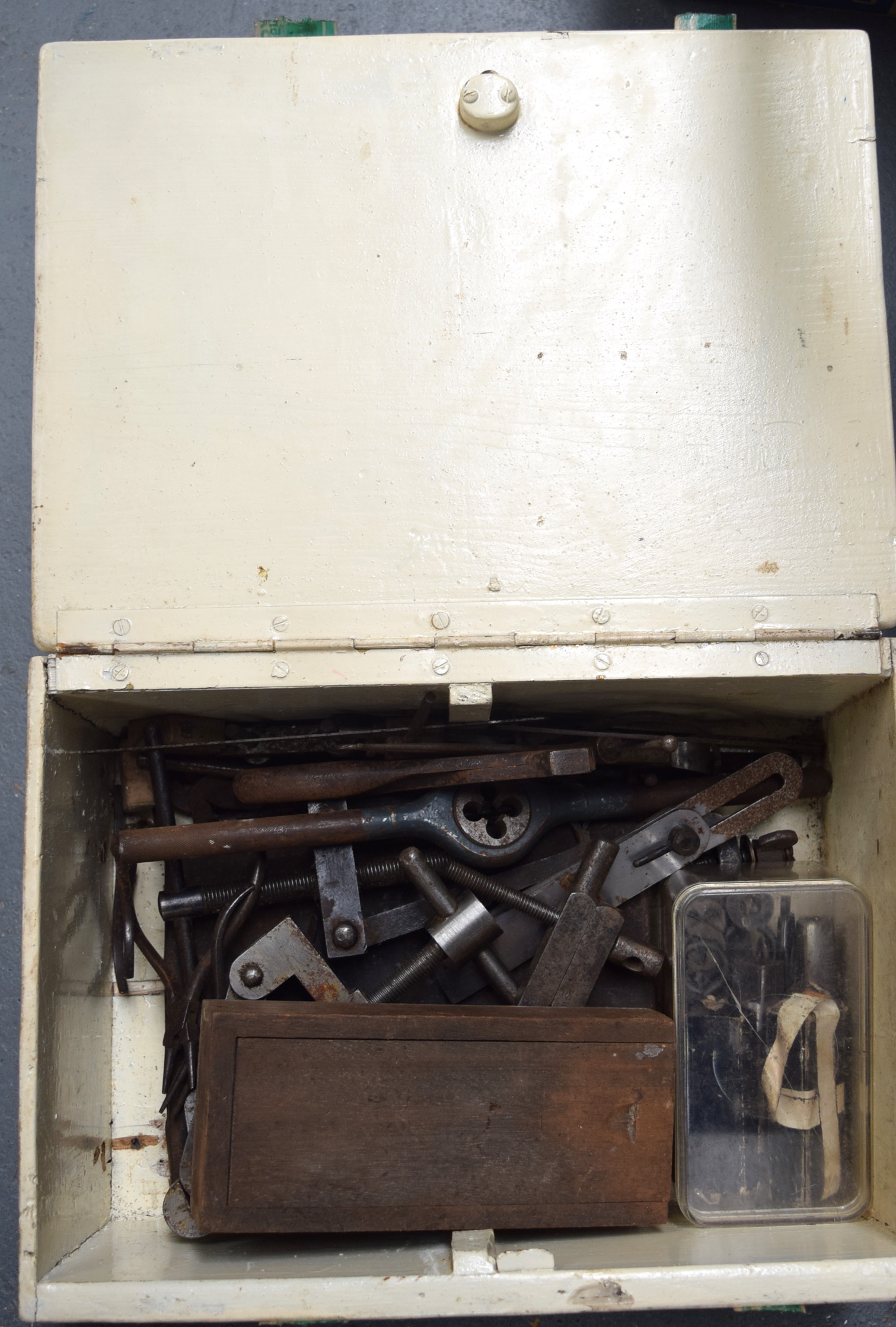 A QUANTITY OF CLOCK MAKERS TOOLS, contained within a wooden box.
