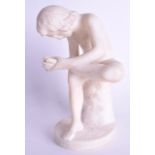 A 19TH CENTURY CONTINENTAL CARVED ALABASTER FIGURE OF A MALE modelled picking a thorn. 22 cm high.