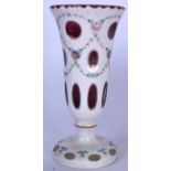 AN EARLY 20TH CENTURY FRENCH BOHEMIAN GLASS PEDESTAL VASE, decorated with foliage. 20.5 cm high.