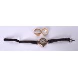 AN ART DECO 9CT GOLD LADIES WATCH, together with two rings. (3)