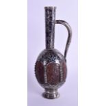 A RARE 19TH CENTURY RUSSIAN SILVER NIELLO CARVED COCONUT EWER decorated all over with vines. 26 cm h