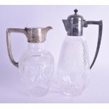 TWO ANTIQUE SILVER AND CUT GLASS CLARET JUGS. 27 cm & 22 cm high. (2)