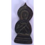 AN EARLY 20TH CENTURY RUSSIAN BRONZE PLAQUE OR PENDANT IN THE FORM OF A SAINT, formed with arms in f