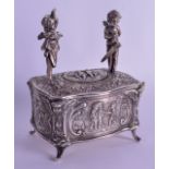 A RARE ANTIQUE CONTINENTAL SILVER AUTOMATON SINGING BIRD BOX decorated with putti amongst landscapes