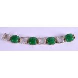 AN ART DECO FRENCH GREEN AND CLEAR CRYSTAL BRACELET. 18 cm long.