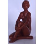 A GMUNDNER KERAMIK AUSTRIAN TERRACOTTA FIGURE OF A NUDE FEMALE, modelled seated with legs crosses, s