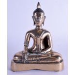 A 19TH CENTURY ASIAN THAI BRONZE FIGURE OF A BUDDHA modelled upon a triangular base. 21 cm x 13 cm.