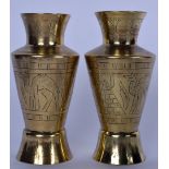 A PAIR OF MID 20TH CENTURY EGYPTIAN BRASS VASE, incised decoration depicting pyramids, sphinx and ca