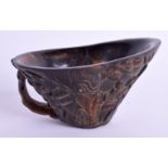 A CHINESE BUFFALO HORN LIBATION CUP. 11 cm wide.