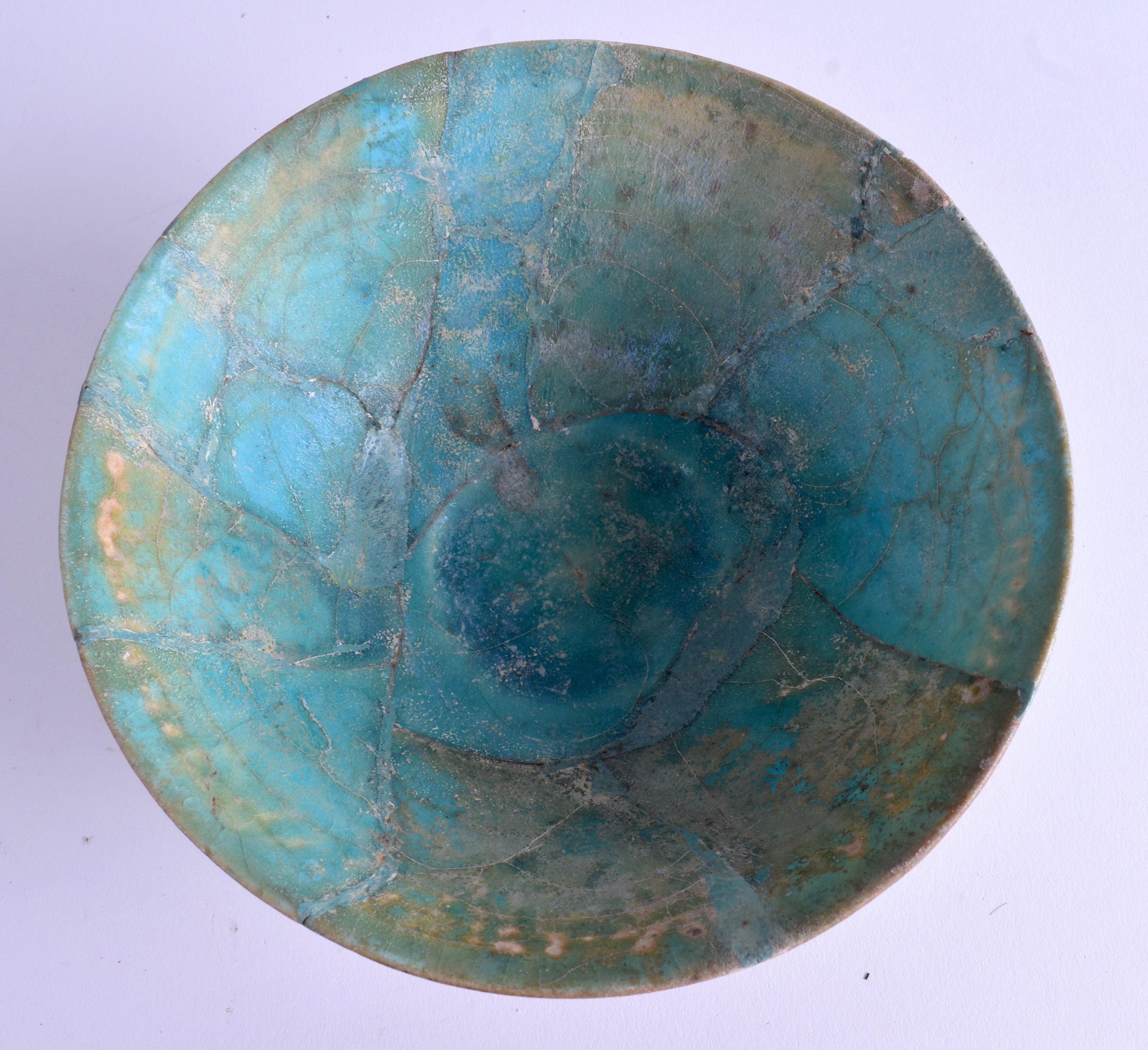 A MIDDLE EASTERN KASHAN POTTERY BOWL. 15 cm wide.