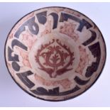 A MIDDLE EASTERN ISLAMIC POTTERY BOWL. 18 cm wide.