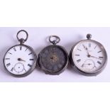 THREE SILVER POCKET WATCHES. Largest 4 cm wide. (3)