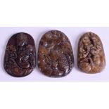 THREE CHINESE HARDSTONE PENDANTS. (3)