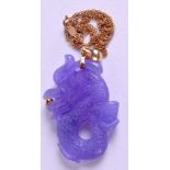 AN EARLY 20TH CENTURY CHINESE LAVENDER JADE NECKLACE. Pendant 2 cm x 3 cm.