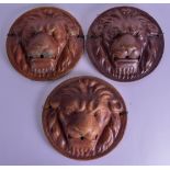 A VERY RARE SET OF 19TH CENTURY ENGLISH STONEWARE LION WALL ROUNDELS of large proportions,