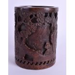 A CHINESE BRONZE BRUSH POT. 14 cm high.