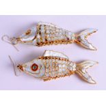 A PAIR OF INDIAN ENAMELLED RETICULATED FISH. 7 cm wide.