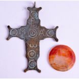 A MIDDLE EASTERN AGATE ROUNDEL together with a bronze pendant. (2)
