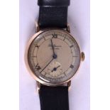 A 9CT GOLD J W BENSON WRISTWATCH. 3.25 cm wide.