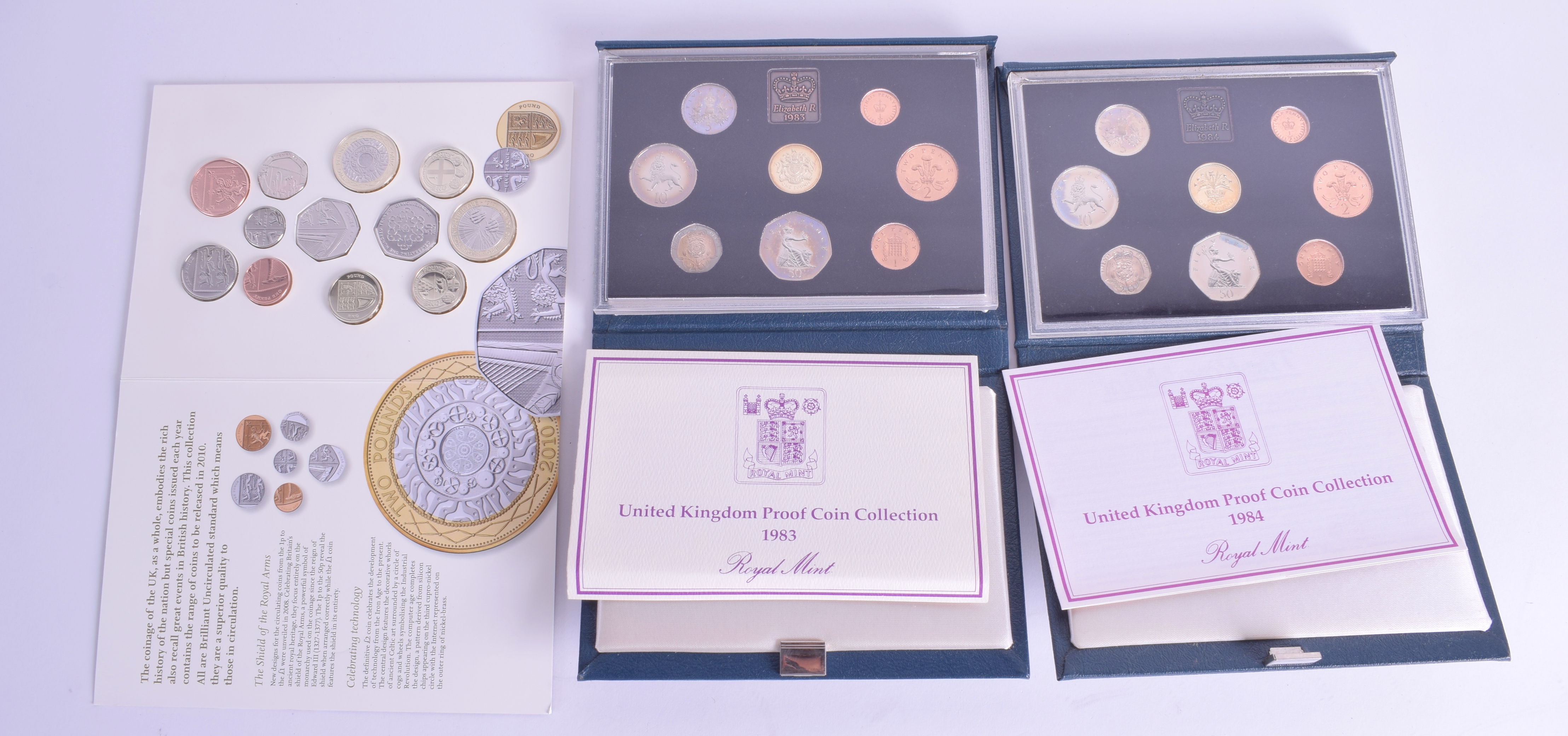 THREE BOXED COIN SETS. (3)