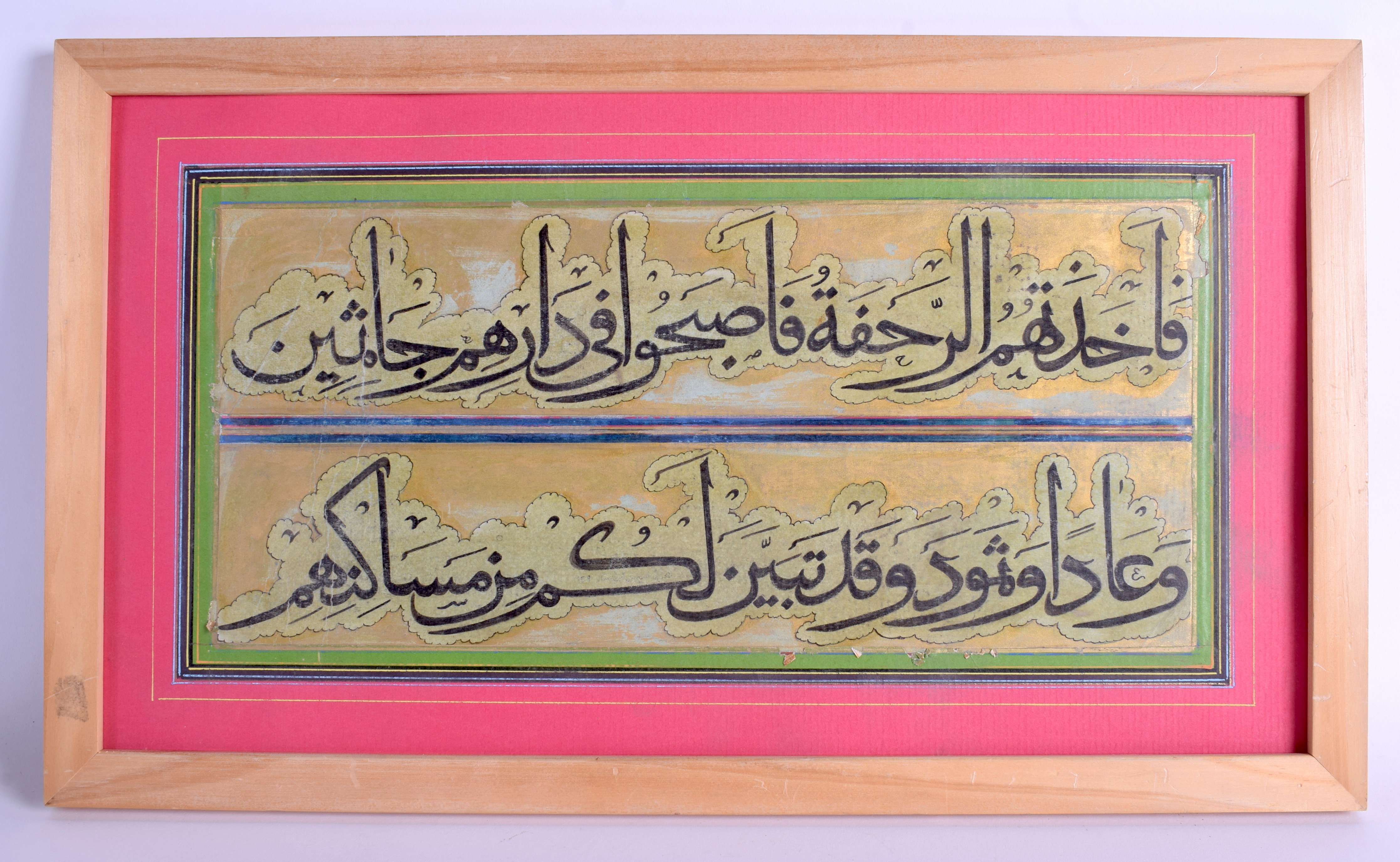 A MIDDLE EASTERN CALLIGRAPHY PANEL. 43 cm x 22 cm.