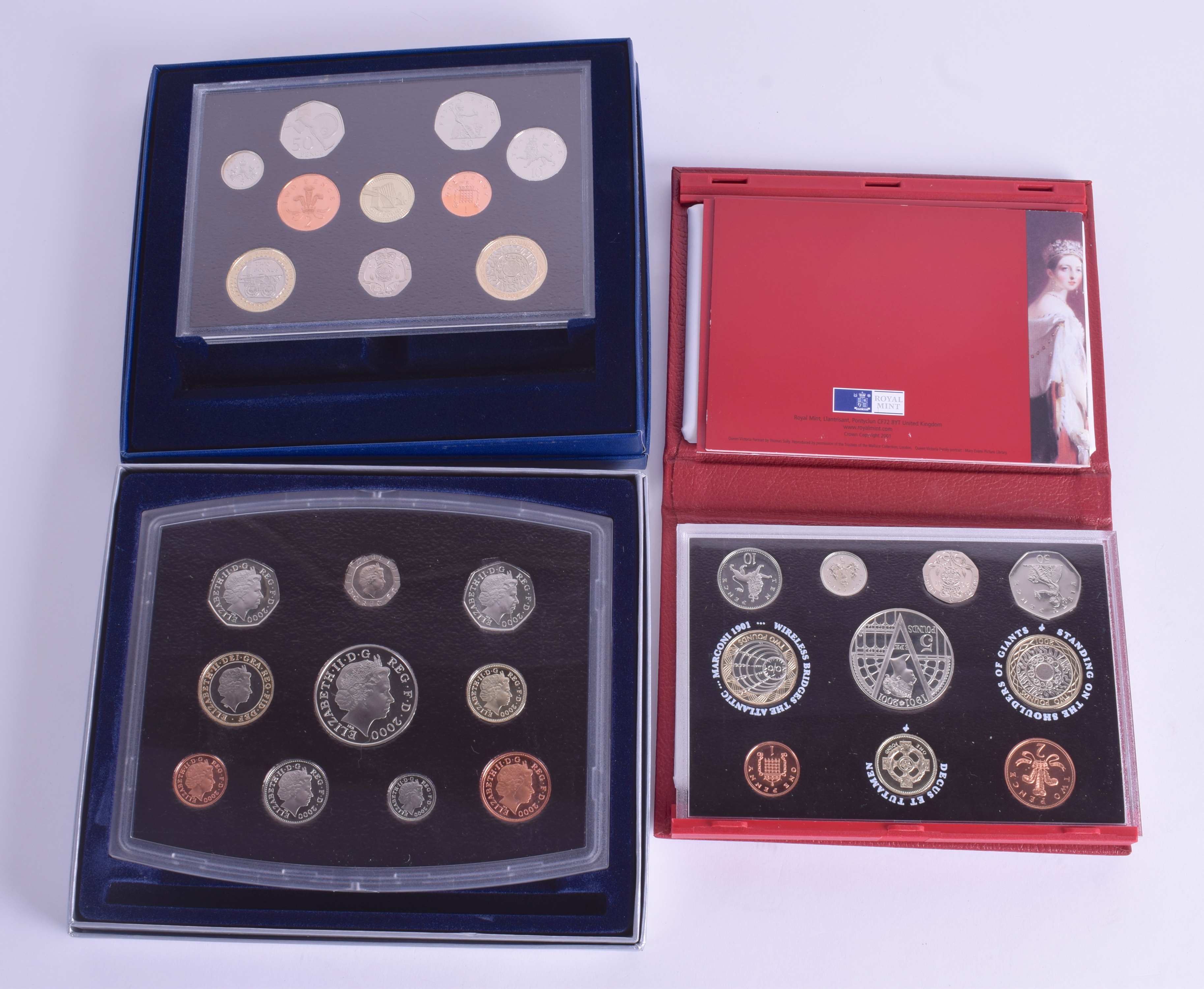 THREE BOXED COIN SETS. (3)