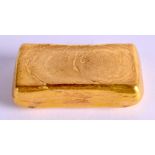 A CHINESE YELLOW METAL INGOT. 217 grams. 5.75 cm x 3 cm.