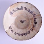 A MIDDLE EASTERN POTTERY BOWL. 19 cm wide.