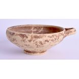 A MIDDLE EASTERN POTTERY BOWL. 14 cm wide.