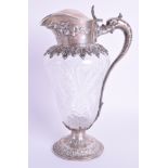 AN ANTIQUE STERLING SILVER JUG. 19 cm high.