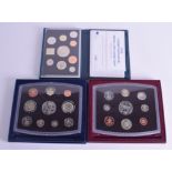 THREE BOXED COIN SETS. (3)