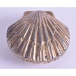 AN ANTIQUE FRENCH SILVER AND 18CT GOLD CLAM SHELL COMPACT. 4.5 cm wide.