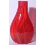 A LARGE RED ITALIAN MURANO GLASS VASE, formed with swirling streak design to body. 35 cm x 19 cm.