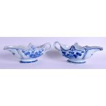 A GOOD PAIR OF 18TH CENTURY CHINESE EXPORT SAUCEBOATS Yongzheng/Qianlong, painted with flowers and