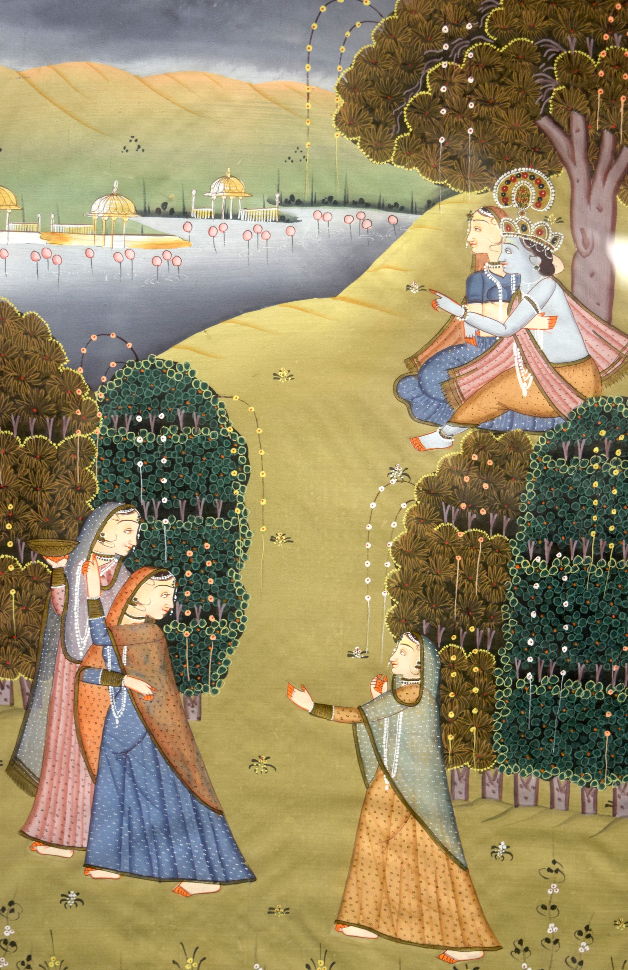 AN EARLY 20TH CENTURY INDIAN GOUACHE ON SILK PAINTING, depicting a God embracing a female in a land - Image 2 of 3