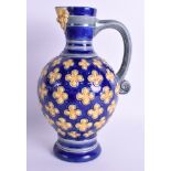 A 19TH CENTURY MINTON POTTERY JUG decorated with floral roundels. 25.5 cm high.