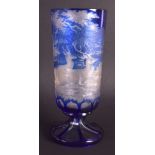 A RARE 19TH CENTURY BOHEMIAN BLUE FLASH GOBLET decorated with stags within landscapes. 21 cm high.