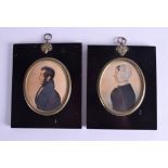 A PAIR OF EARLY 19TH CENTURY PAINTED PORTRAIT MINIATURES depicting figures in black coats. 7.5 cm x